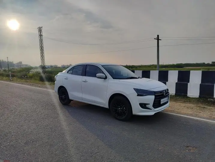 Maruti Suzuki Swift Dzire white sedan